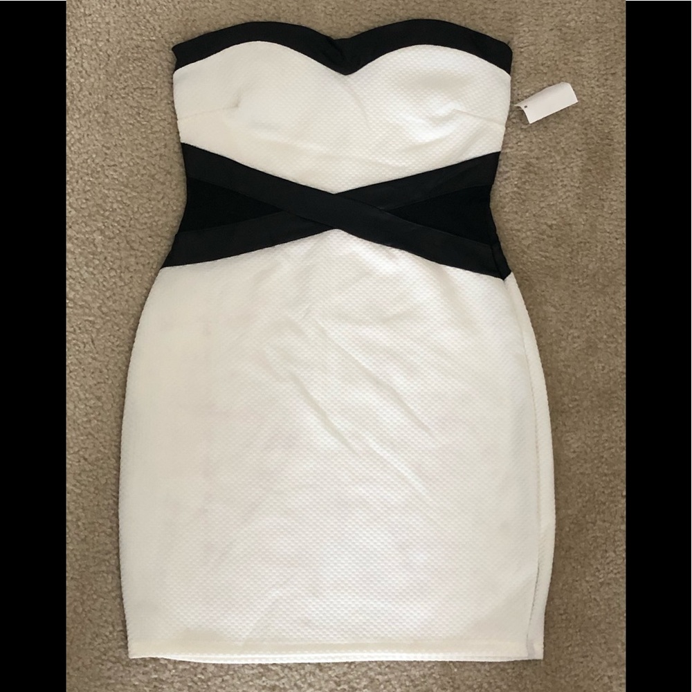 Brand new. Black/White mini dress